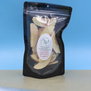 Freeze-dried apple slices in black packaging
